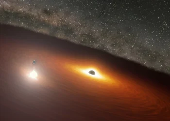 Galáxia com dois buracos negros gigantes dispara jato de plasma “quebrado”